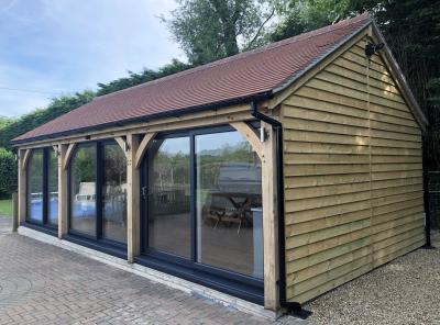 Pic 96. 9.0m x 4.8m 3 bay Carriage House with plain tiles and sliding patio doors